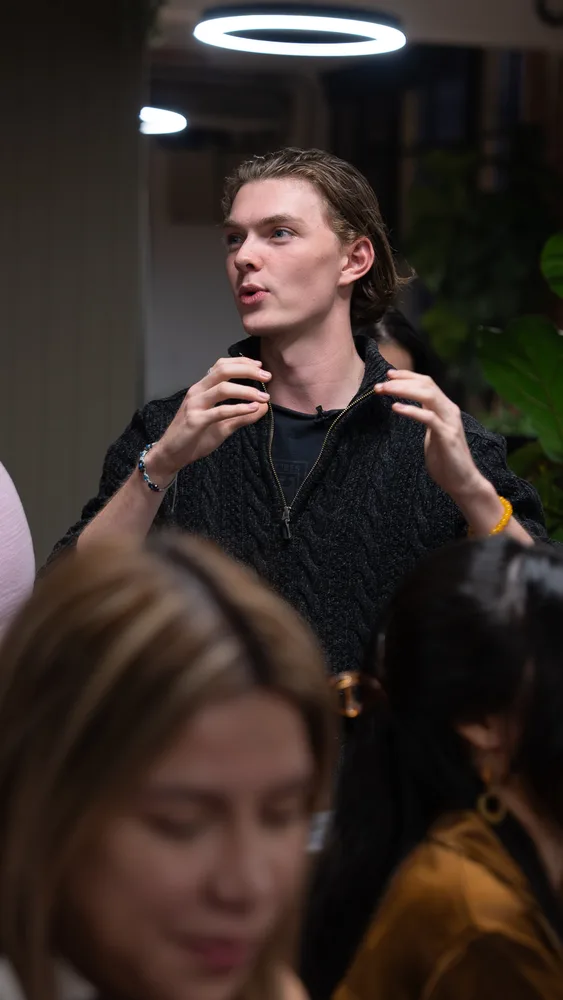 Guests listening and exchanging ideas at a Melbourne storytelling event.