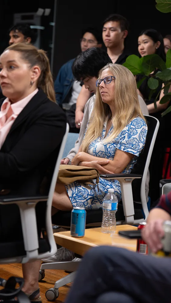 Guests listening and exchanging ideas at a Melbourne storytelling event.