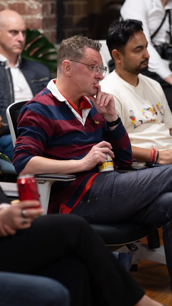 Guests listening and exchanging ideas at a Melbourne storytelling event.