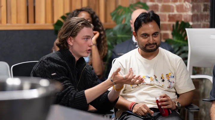 Guests listening and exchanging ideas at a Melbourne storytelling event.