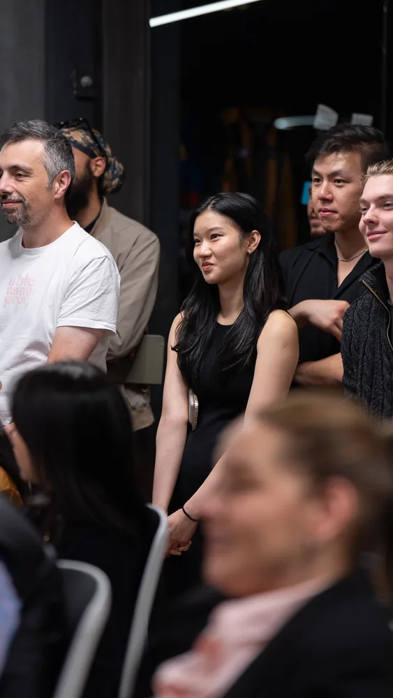 Guests listening and exchanging ideas at a Melbourne storytelling event.