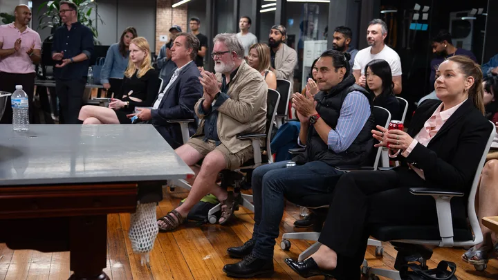 Guests listening and exchanging ideas at a Melbourne storytelling event.