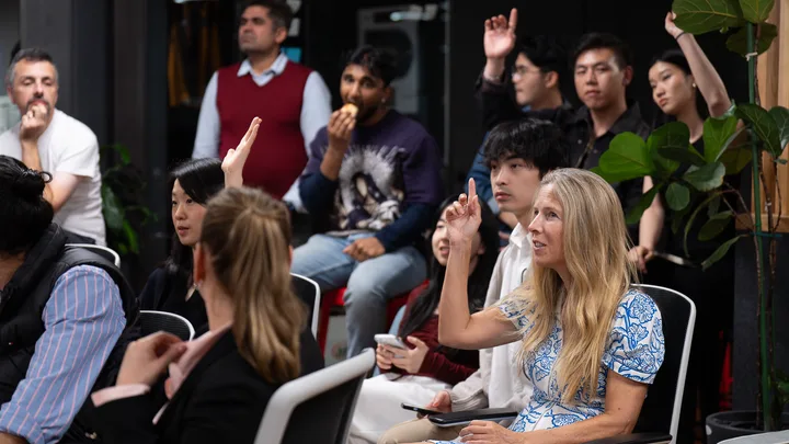 Guests listening and exchanging ideas at a Melbourne storytelling event.