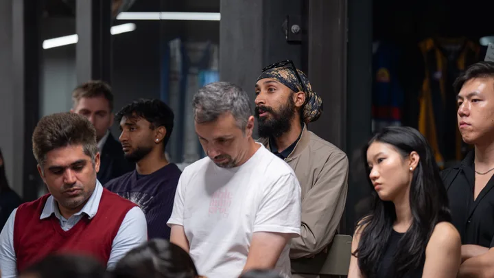 Guests listening and exchanging ideas at a Melbourne storytelling event.