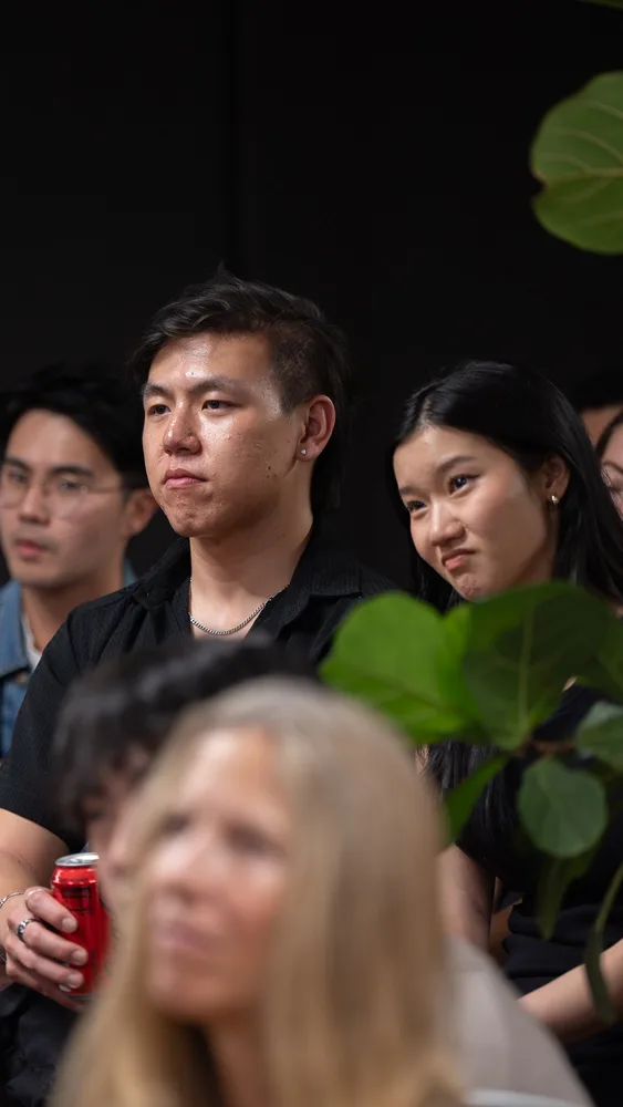 Guests listening and exchanging ideas at a Melbourne storytelling event.