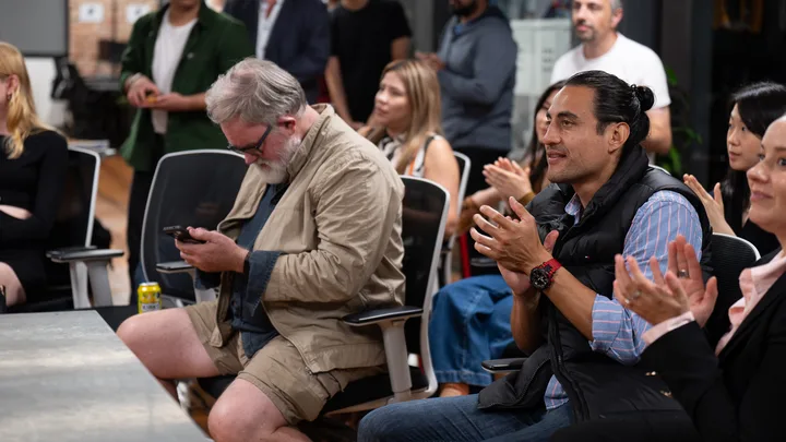 Guests listening and exchanging ideas at a Melbourne storytelling event.