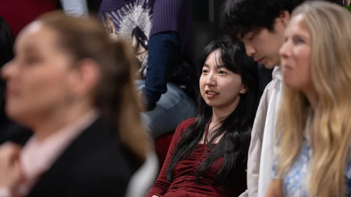 Guests listening and exchanging ideas at a Melbourne storytelling event.