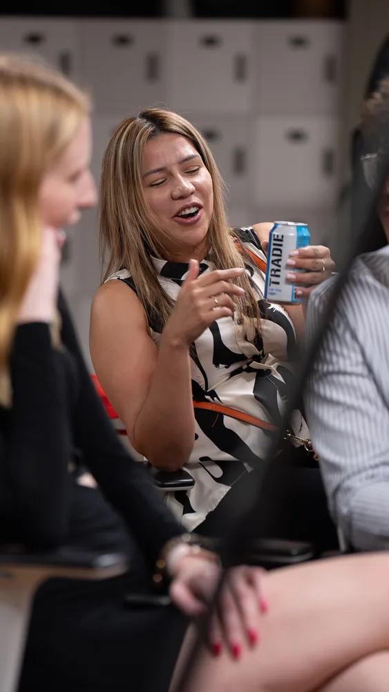 Guests listening and exchanging ideas at a Melbourne storytelling event.