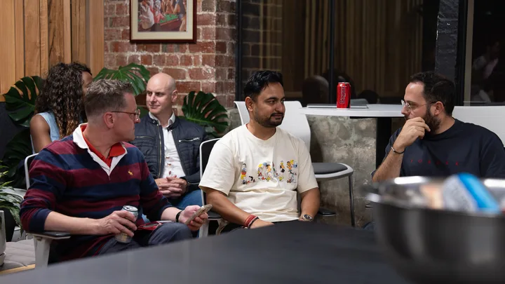 Guests listening and exchanging ideas at a Melbourne storytelling event.