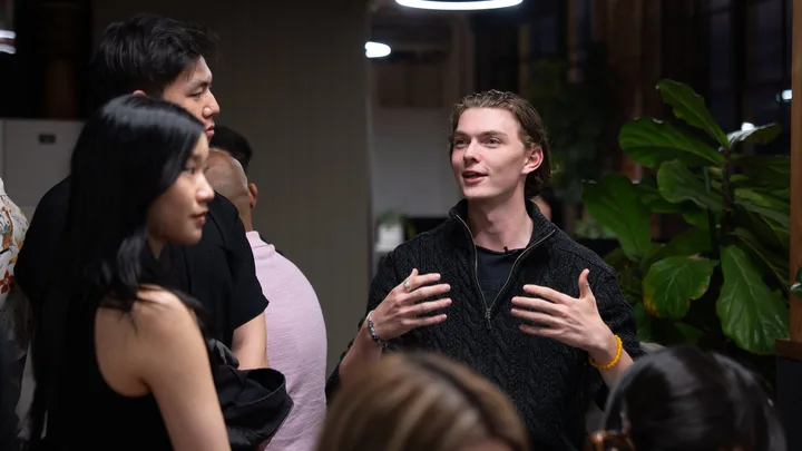 Guests listening and exchanging ideas at a Melbourne storytelling event.