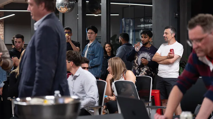 Guests listening and exchanging ideas at a Melbourne storytelling event.