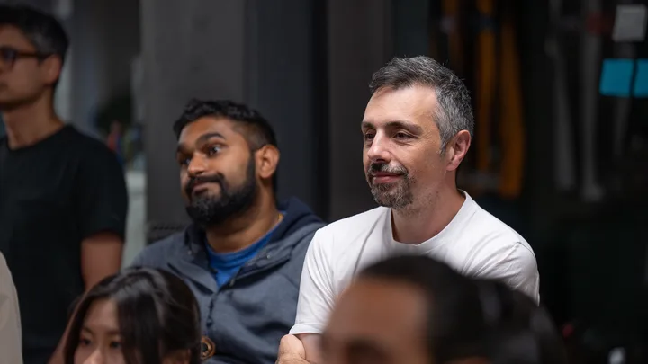 Guests listening and exchanging ideas at a Melbourne storytelling event.