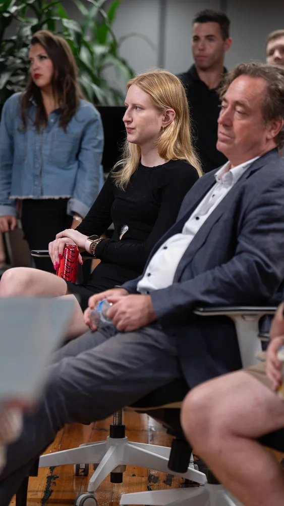 Guests listening and exchanging ideas at a Melbourne storytelling event.