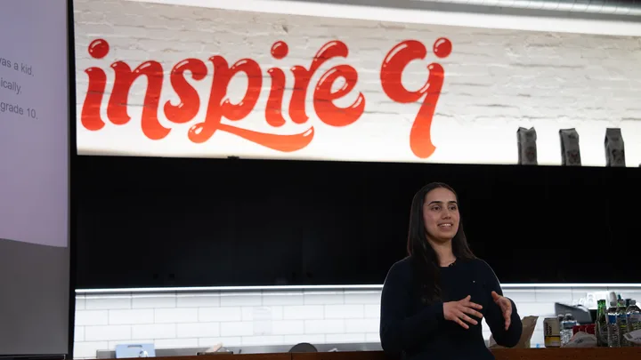A speaker sharing their story at Inspire9.