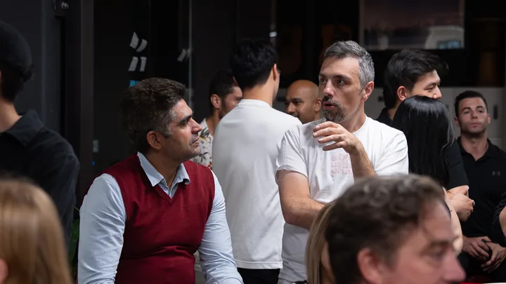 Guests listening and exchanging ideas at a Melbourne storytelling event.