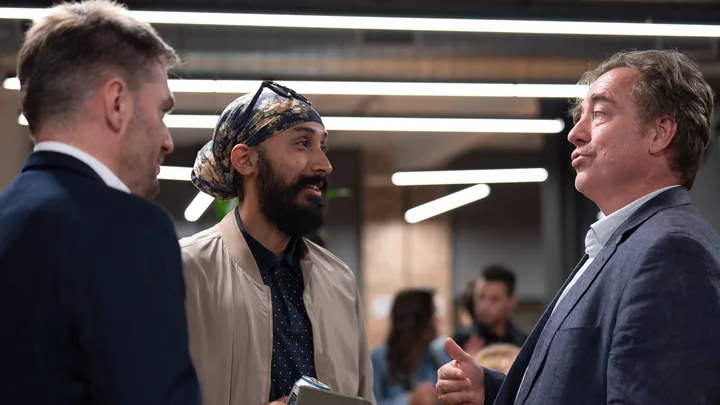 Guests listening and exchanging ideas at a Melbourne storytelling event.